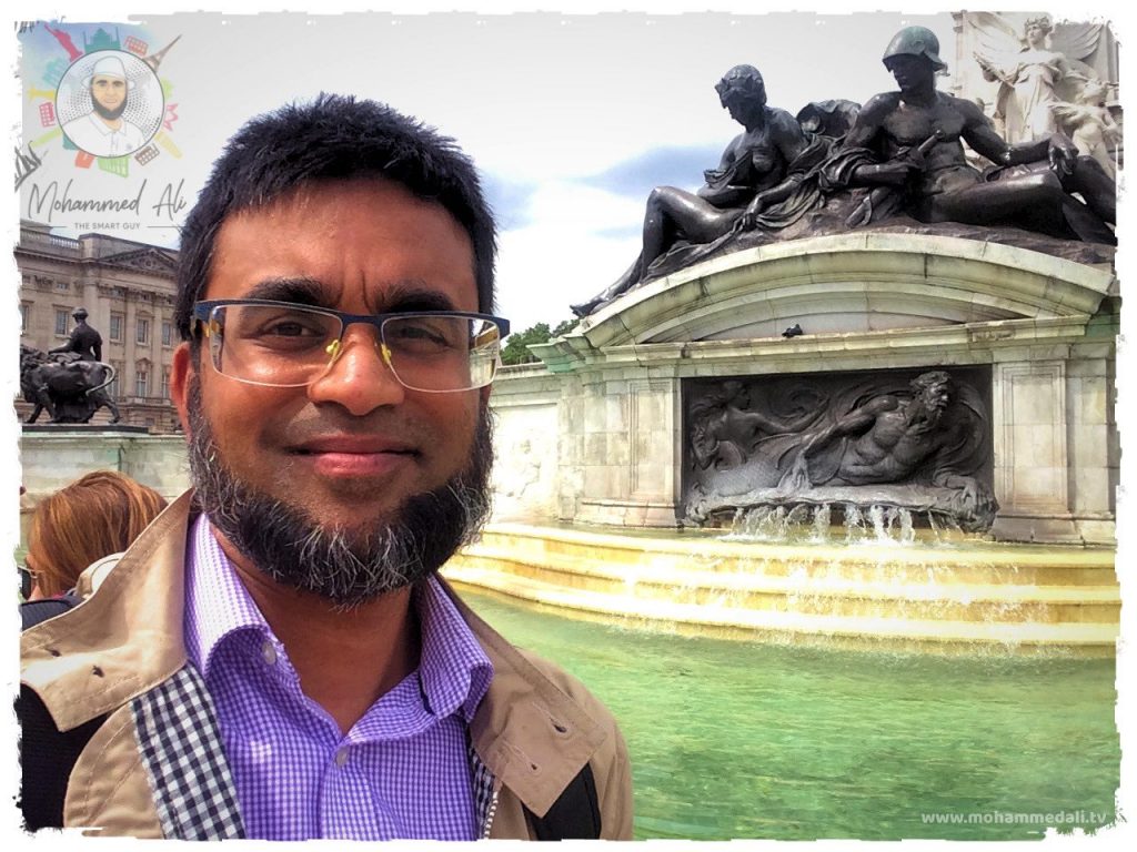 Standing in front of the Buckingham Palace inn London