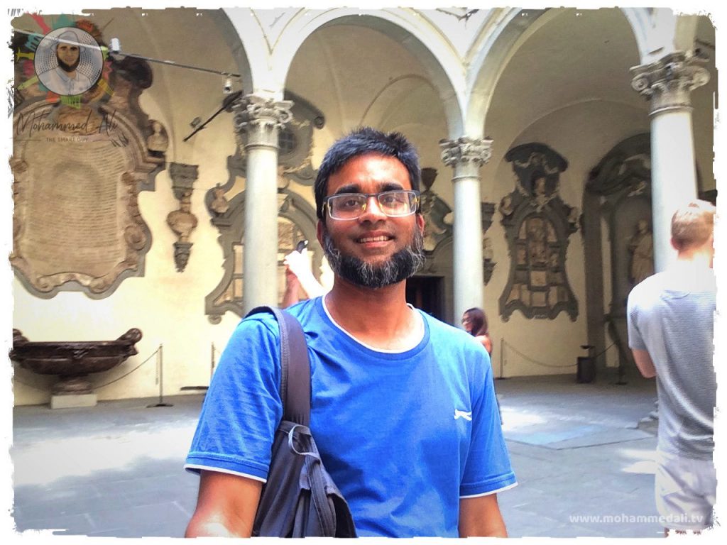 Standing in the courtyard of the Riccardi Medici Palace in Florence, Italy